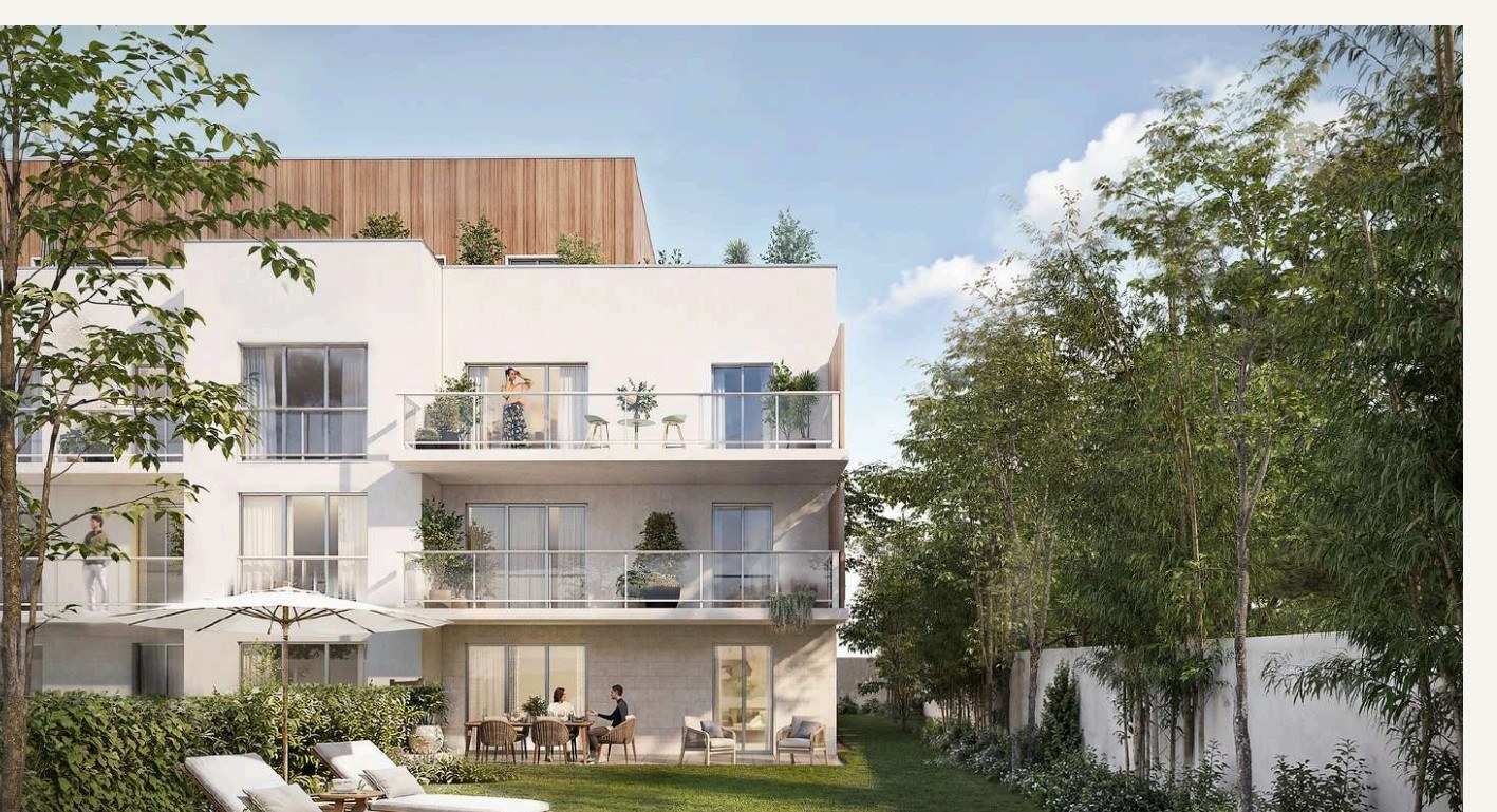 Façade jardin de la résidence avec balcons, terrasses et pelouse